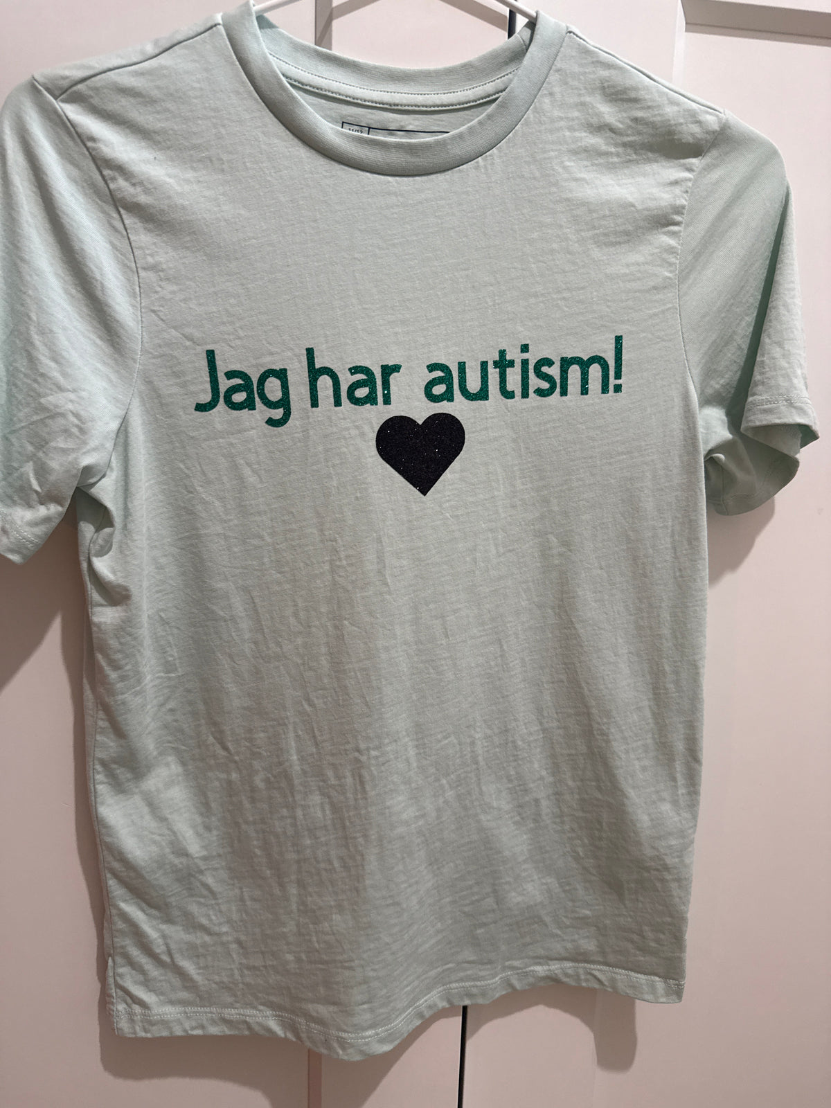 T-shirt mint med grönt tryck