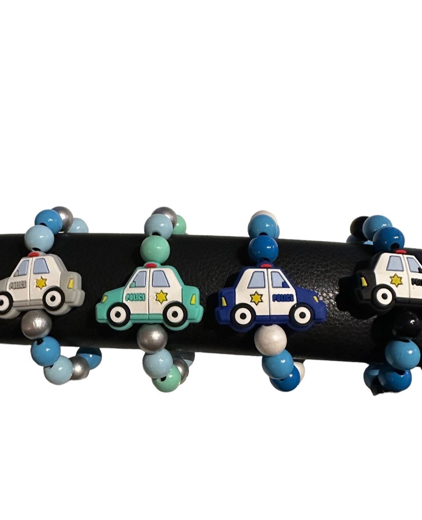 Barnvagnsringar polisbil 2-pack